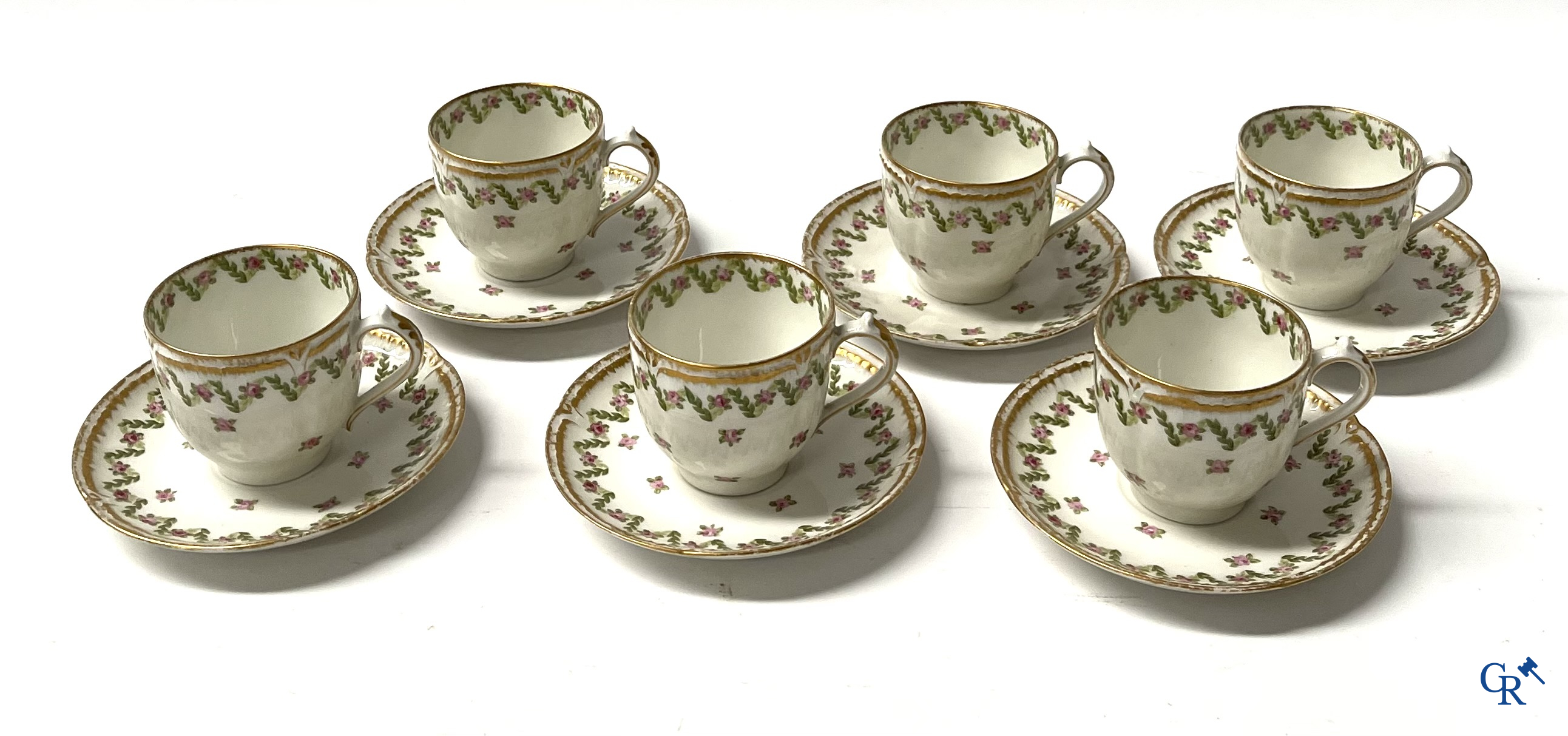 A coffee and tea set with 12 dessert plates in gilded and polychrome decorated French porcelain. Around 1900.