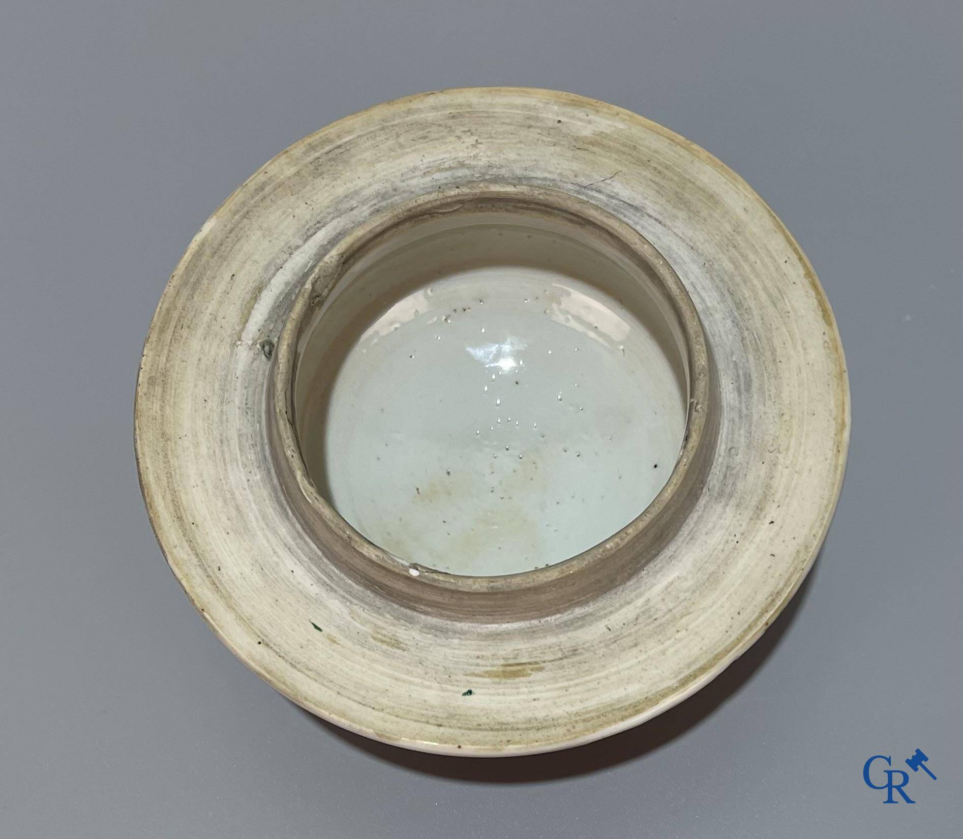 Asian Art, Chinese porcelain, a Chinese Wucai lidded vase with characters.