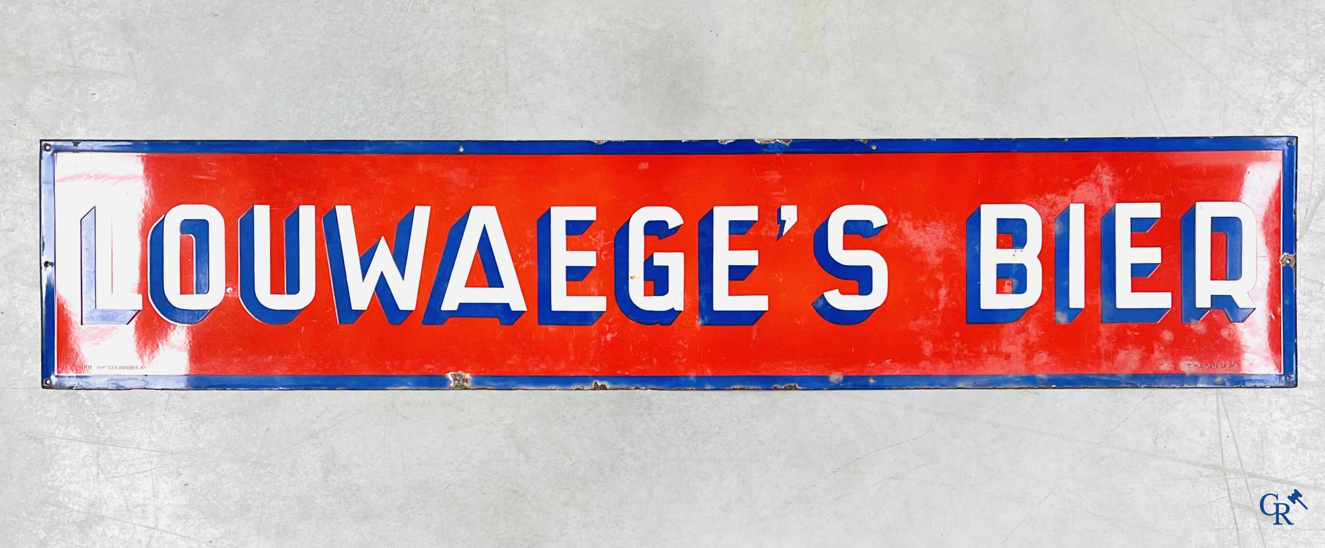 A large enamel advertising sign for Louwaege's beer. Enamel Koekelberg. T.P. Bruxelles 1950.