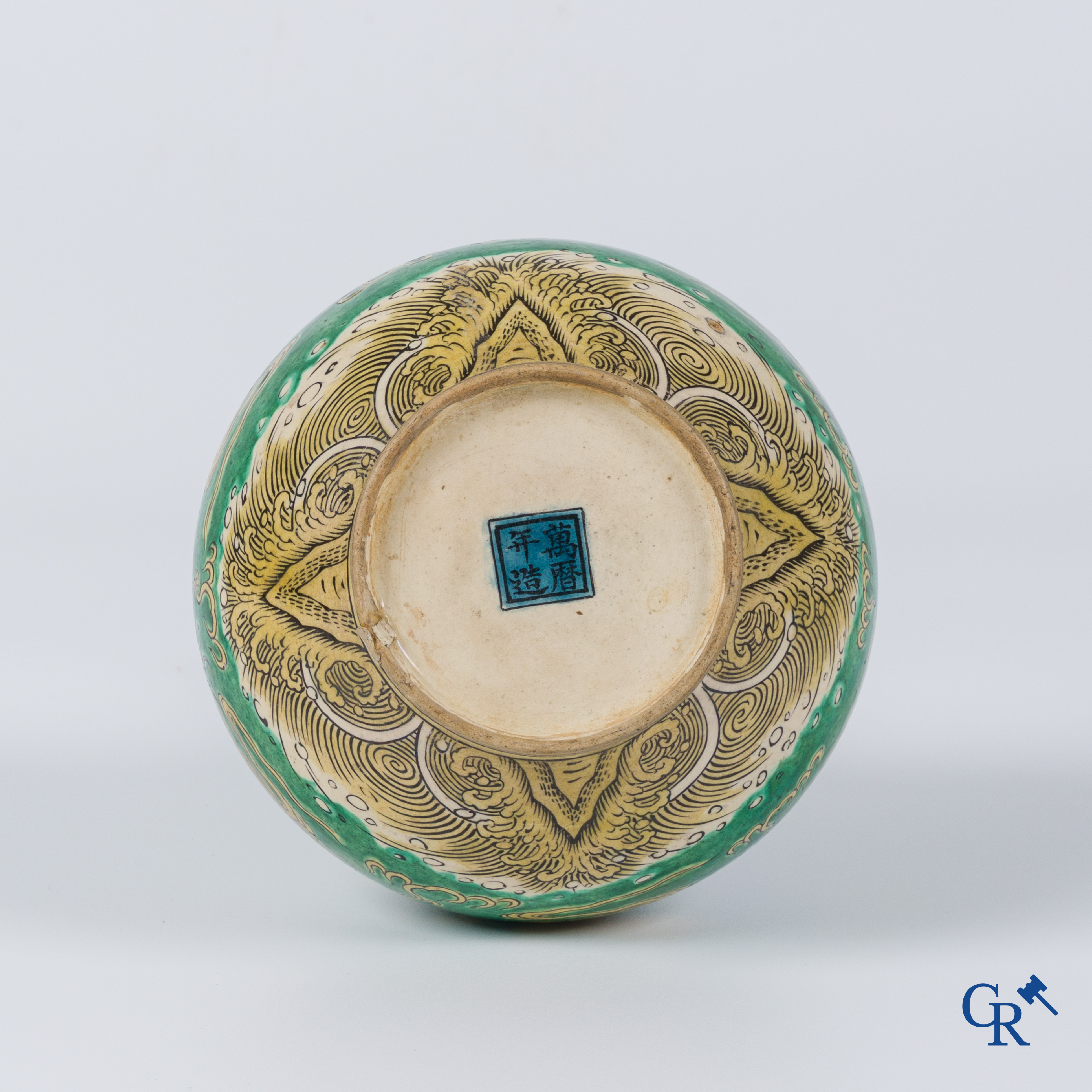 Asian Art, A fine Chinese green and yellow biscuit vase with dragon decor. Marked.