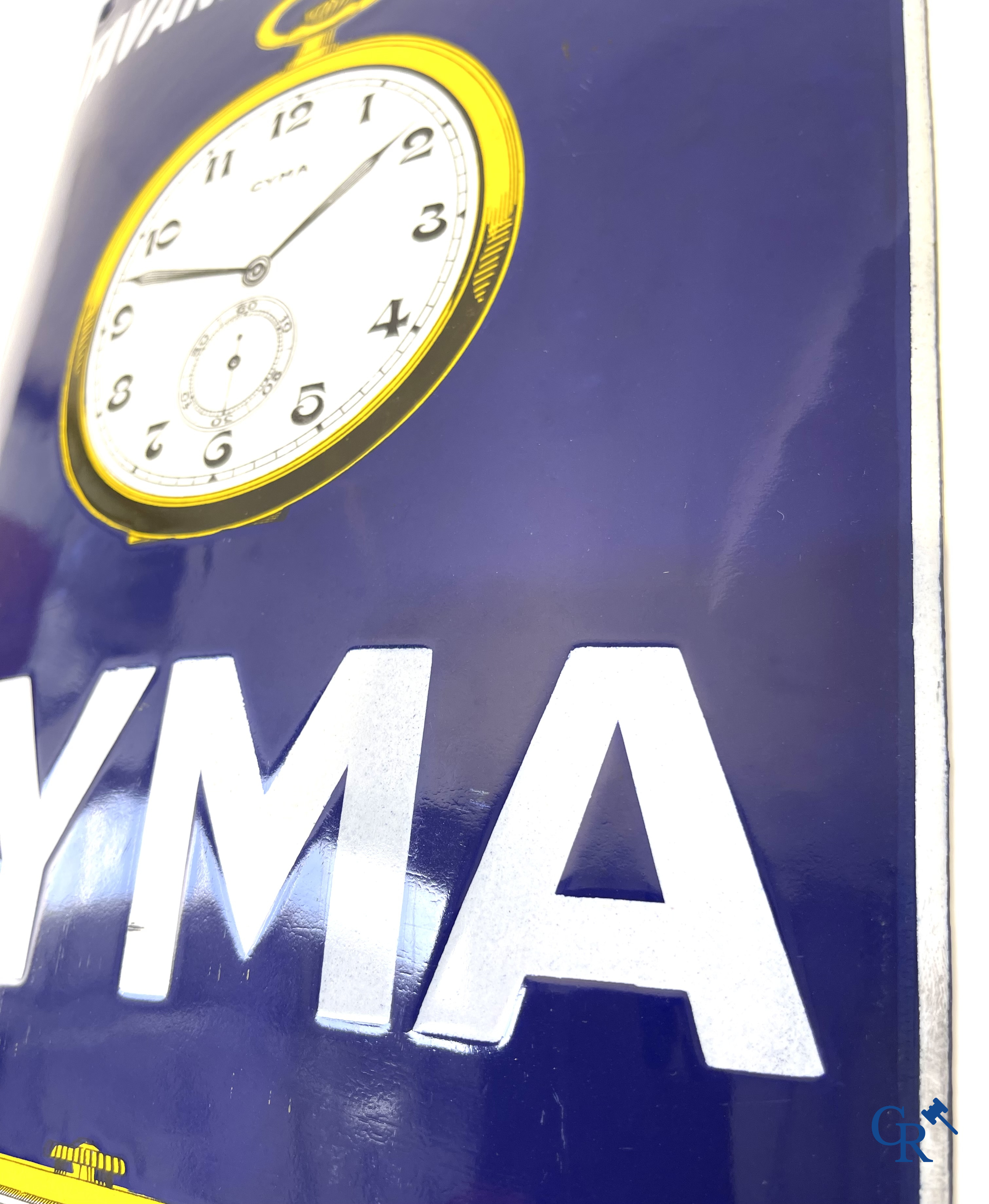Tavannes Watch Company. Bombed enamel advertising sign for Cyma wrist and pocket watches. 1926.