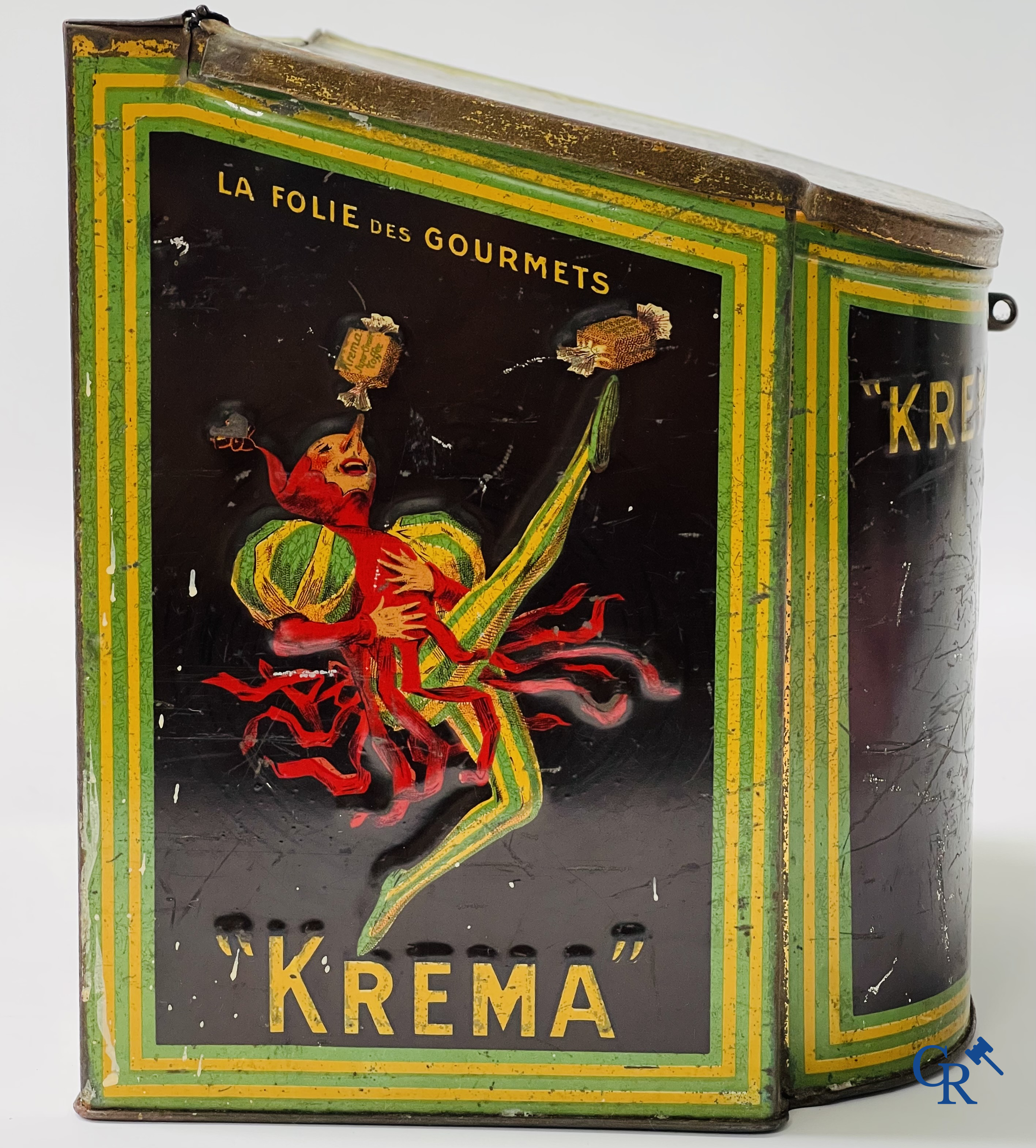 "Krema", Le meilleur bonbon au beurre. Blikdoos met een illustratie van Jean D'Ylen. G. De Andreis & Cie Marseille.