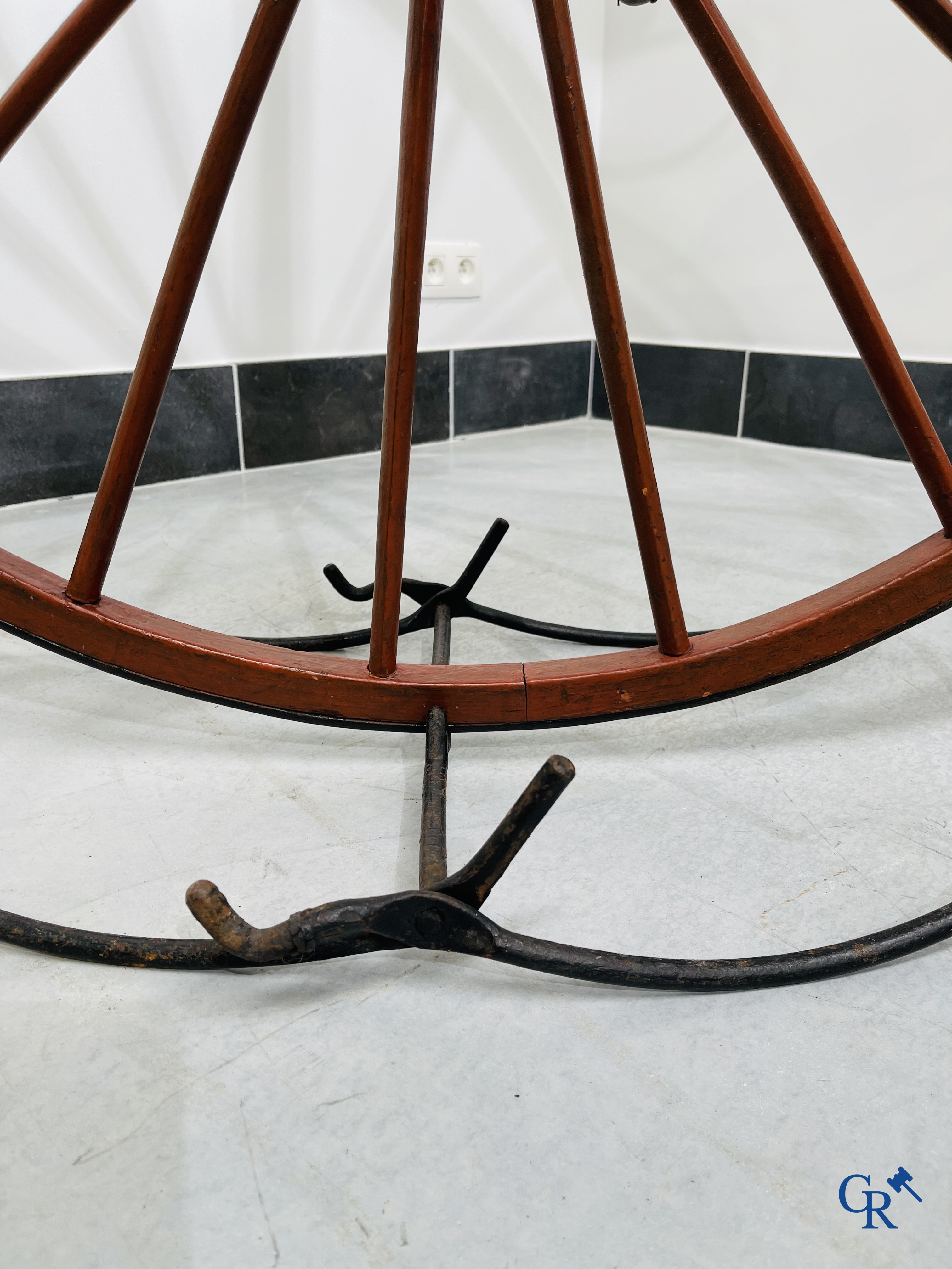 Penny-farthing with wooden spoked wheels on the original wrought iron upright. Circa 1880.