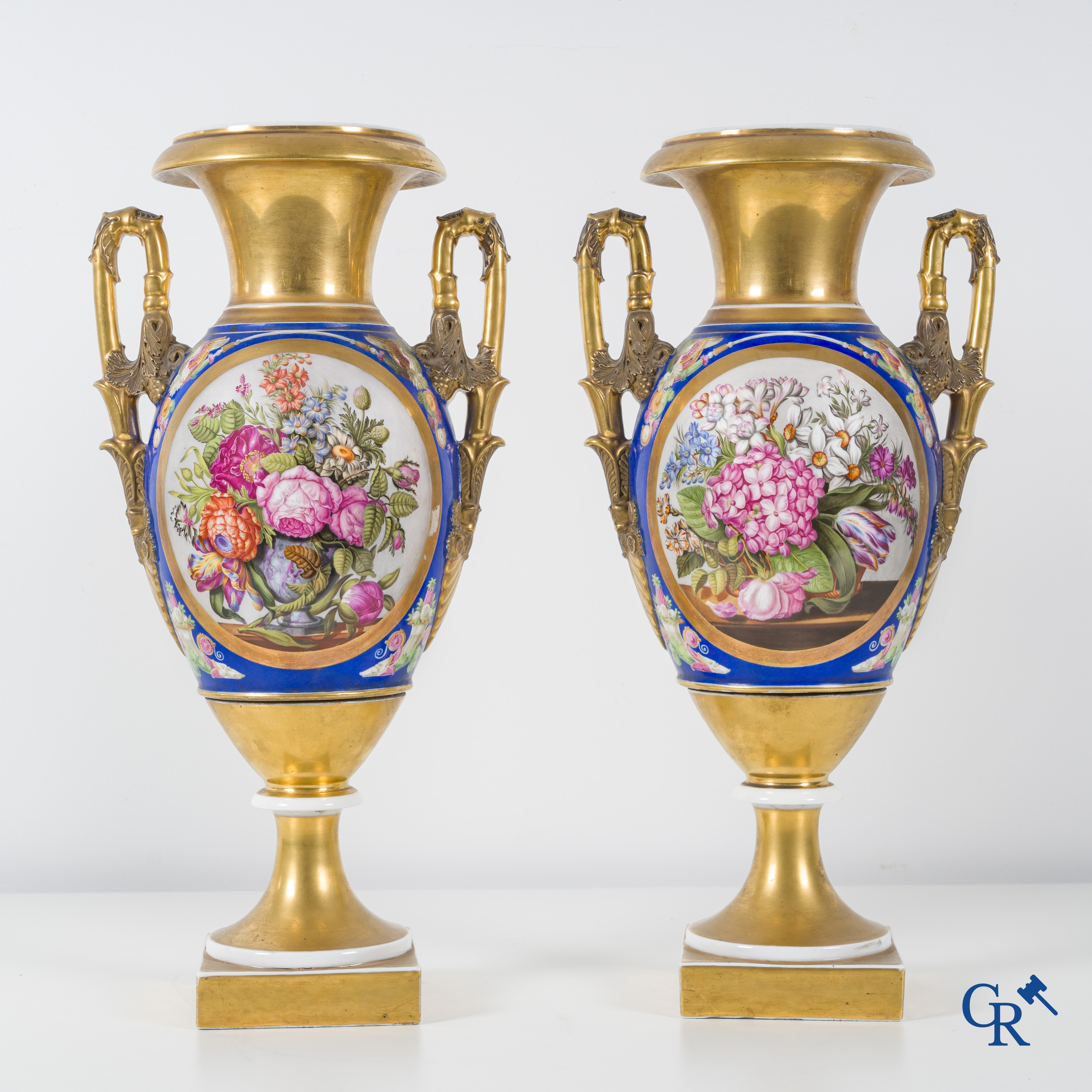 Empire, a pair of imposing multicolored decorated and gilded vases. Early 19th century.